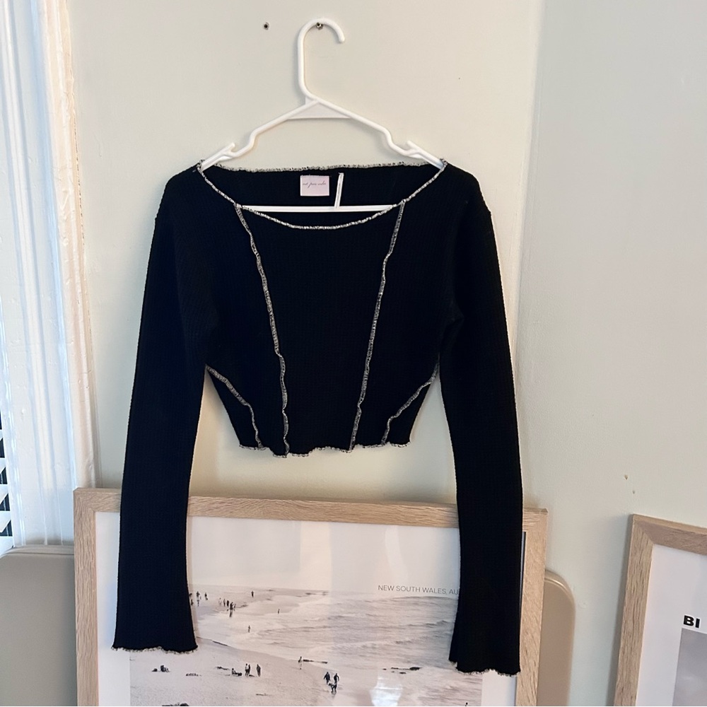Urban Outfitter’s long sleeve black waffle knit top
